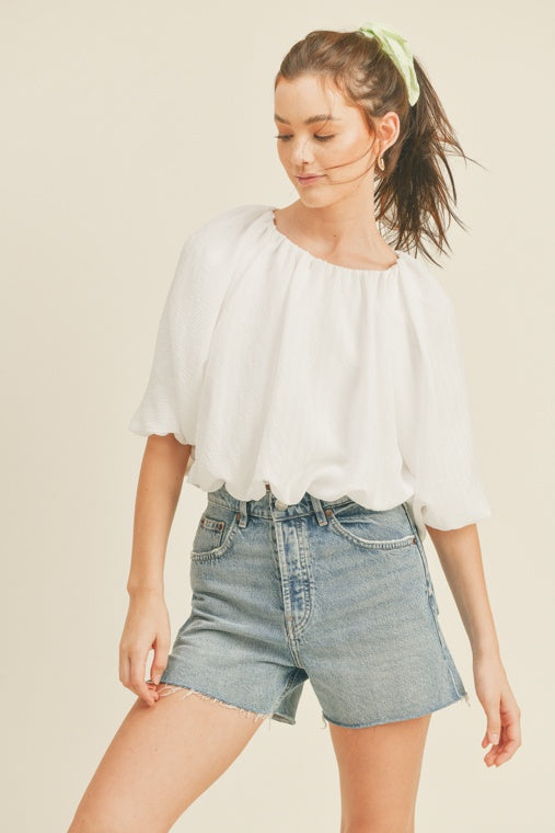white bubble hem tops